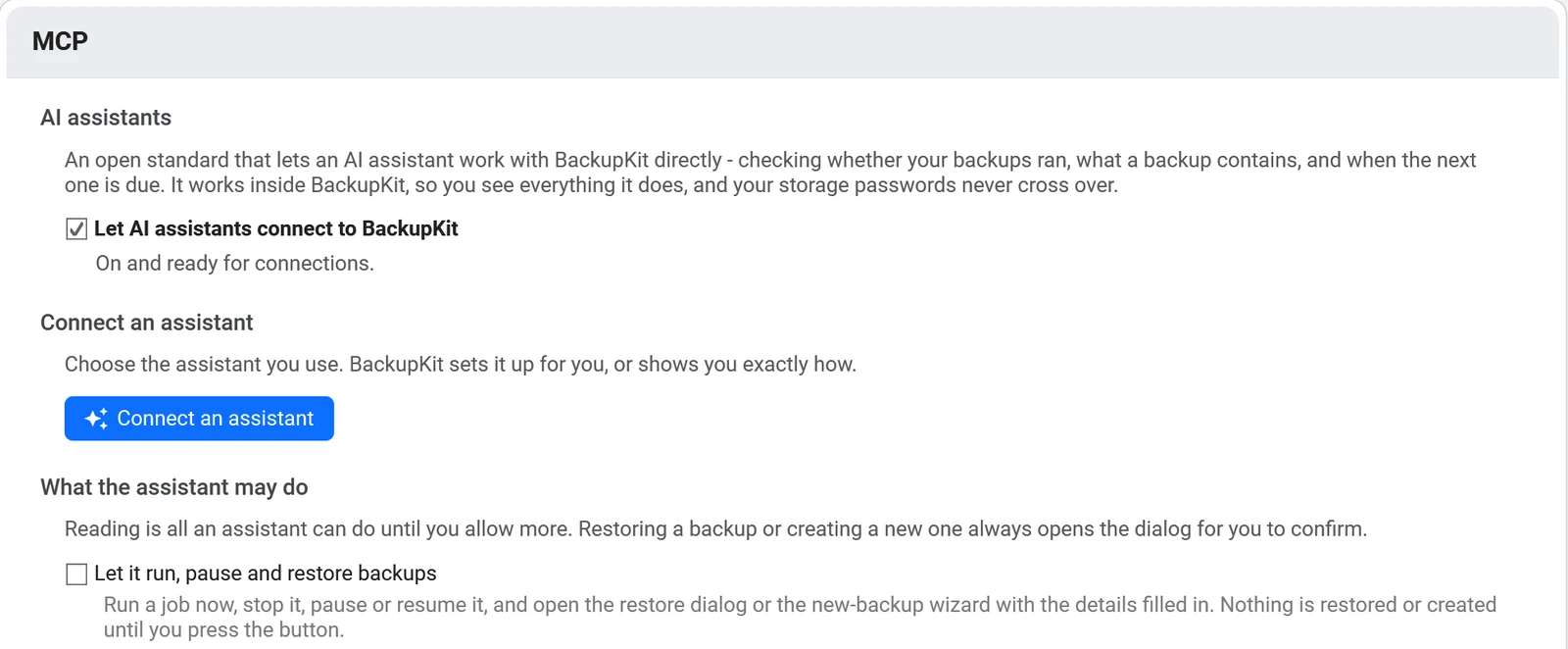 BackupKit's Settings on the MCP page: the switch that lets AI assistants connect, the Connect an assistant button, and a separate, unticked switch that lets it run, pause and restore backups